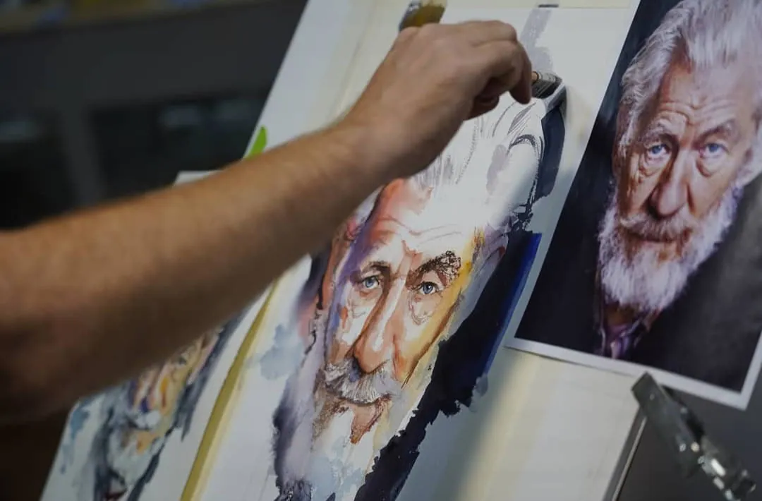 Detalle de un retrato en acuarela a medio pintar